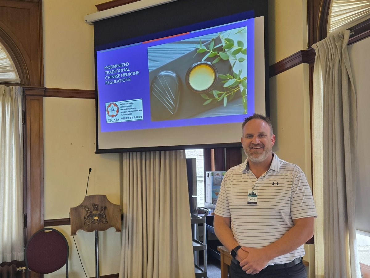Dr. Chris Vallee presenting to Conservative MLAs